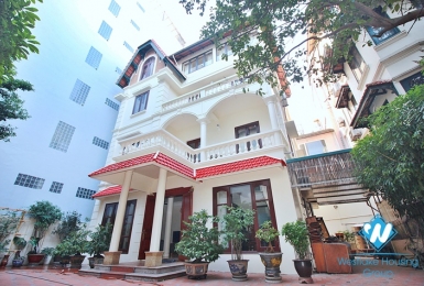 Charming house with nice design and big yard for rent in To Ngoc Van, Tay Ho, Ha Noi